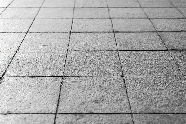 Contesto. Texture di piastrelle pavimentazione quadrata grigia su tutto il telaio. Telaio orizzontale — Foto Stock