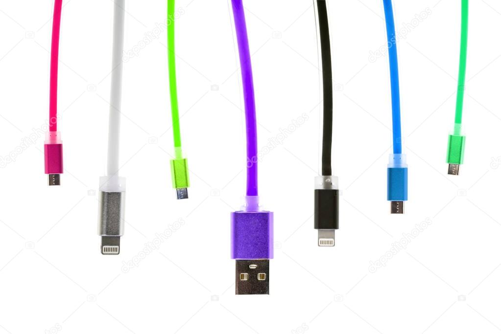 Eight multicolored usb cables, with connectors for micro and for iphone or ipad, hang vertically, on a white isolated background. The family unites. future technologies. Horizontal frame