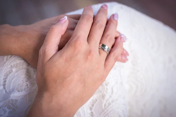 stock image the bride's hand with the ring