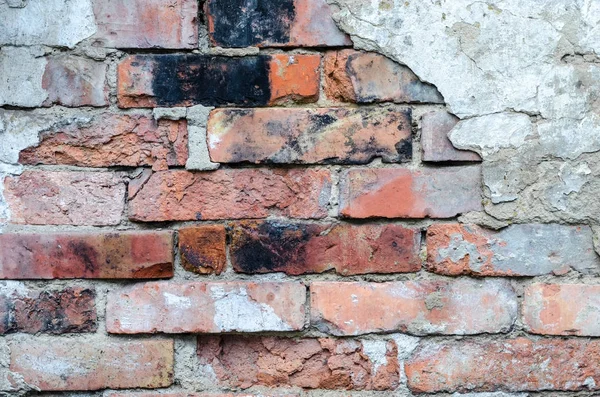 Textuur bakstenen muur met gips peeling — Stockfoto
