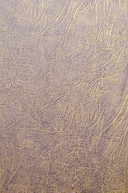 Tüm çerçeve üzerinde dikey hafif kahverengi soyut desenler