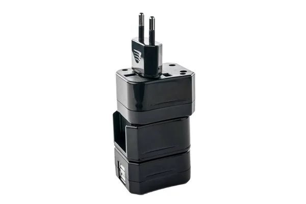 Zwei schwarze Adapter für amerikanische und europäische Stecker auf weißem isolierten Hintergrund — Stockfoto