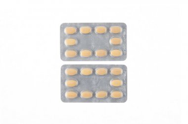 İki tabak beyaz izole zemin üzerine sarı Tablet