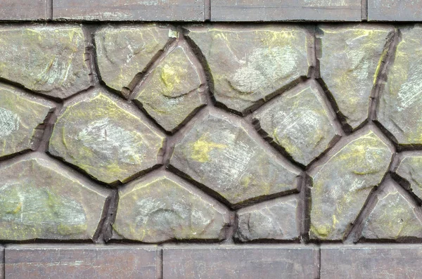Забор из декоративного камня — стоковое фото