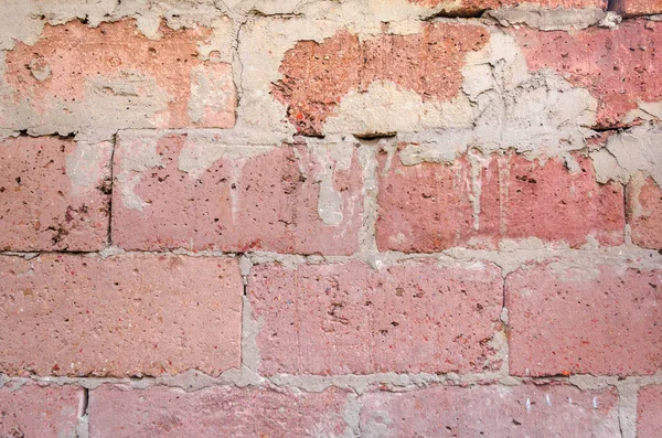 Structuur van een muur van een grote rode bakstenen — Stockfoto
