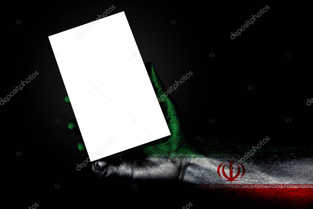 hand with painted flag Iran holding a large white sheet with spa