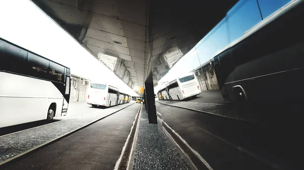 Buses are lining up at the bus stop