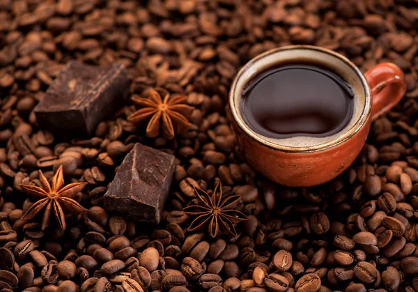 Cup coffee, chocolate and spice. background coffee