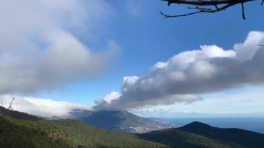 Beautiful panoramic view of Mount Ai-Petri. Mountains, clouds, sea, trees.