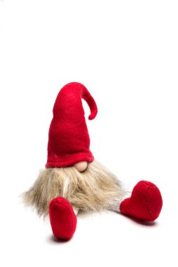 Kırmızı Noel cüce oturmuş