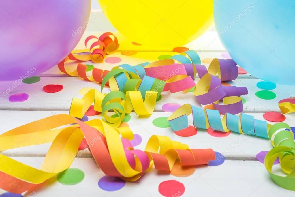 Party Background with Confetti Streamers and Balloons