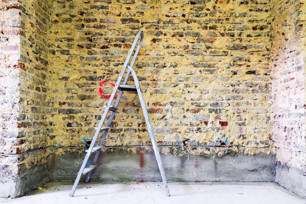 Remediation of brick wall and ladder