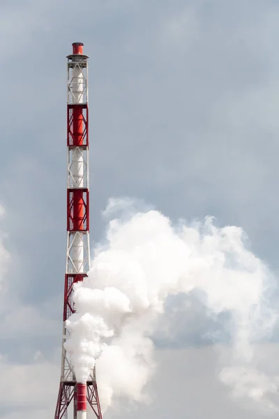 Smoke raising from a chimney — Stock Photo, Image