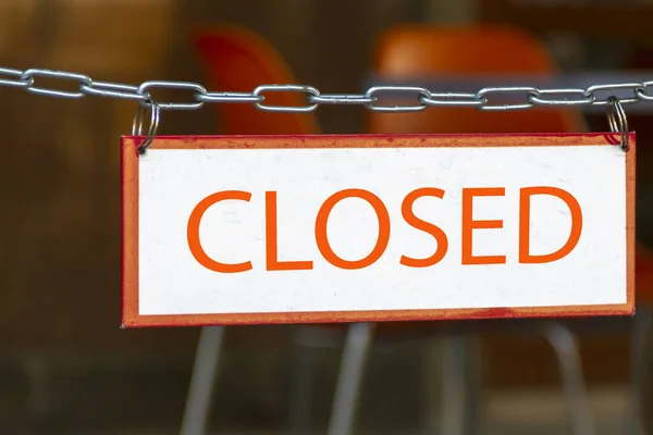 Sign closed hanging in front of cafe entrance — Stock Photo, Image