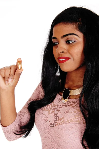 Woman holding vitamin pill. — Stock Photo, Image