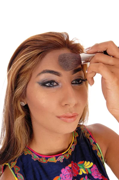 Woman fixing her makeup. — Stock Photo, Image