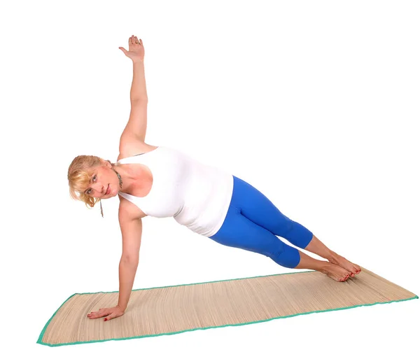 Yoga trainer visar motion poser. — Stockfoto