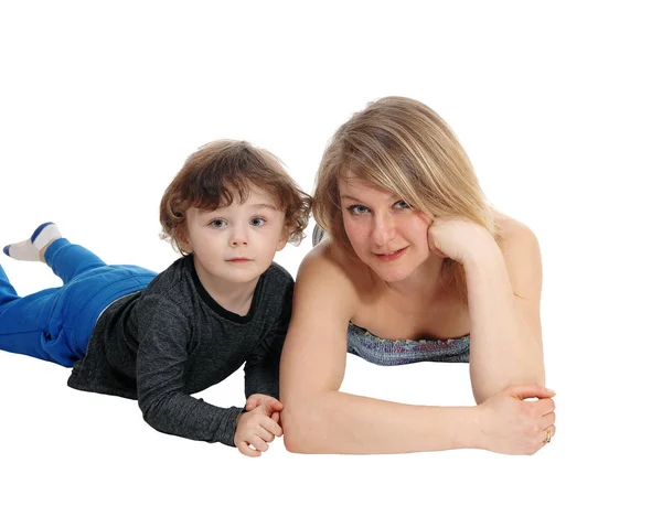 Mother and son lying on floor. — Stock Photo, Image