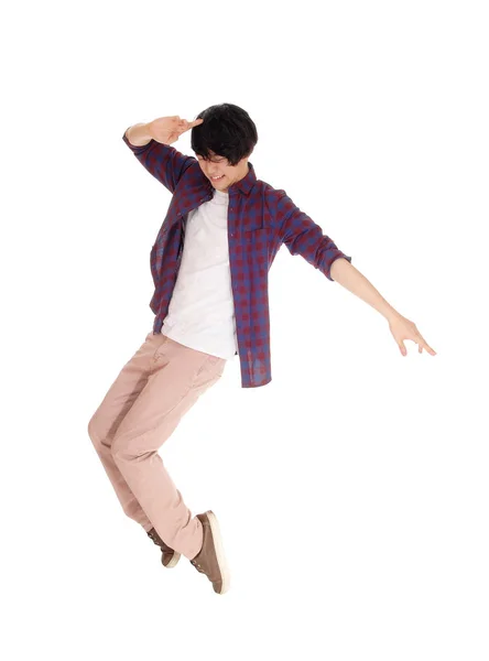 Asian man dancing on his toes. — Stock Photo, Image