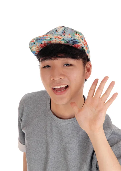 Happy Asian man with cap. — Stock Photo, Image