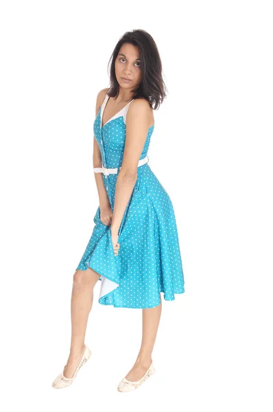 Serious Hispanic woman in blue dress. — Stock Photo, Image