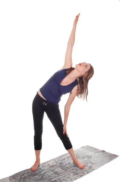 Mulher esticando seu corpo — Fotografia de Stock