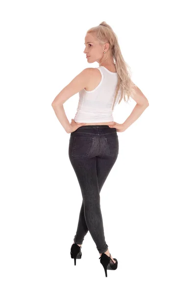 Mujer alta y delgada de pie desde la espalda —  Fotos de Stock