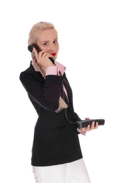 Business woman talking on an old phone — Stock Photo, Image