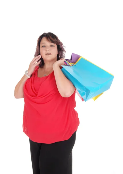 Mujer con sobrepeso sosteniendo su bolsa de compras — Foto de Stock