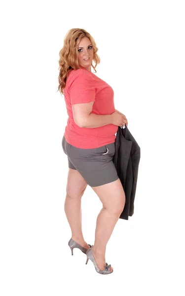 Vrouw in korte broek en hielen permanent — Stockfoto
