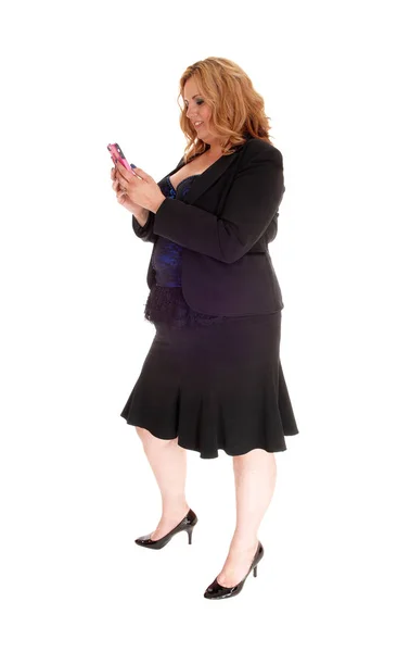 Big business woman texting on her cell phone — Stock Photo, Image