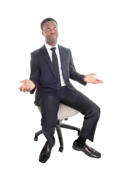 Sentado homem de negócios está confuso, querendo saber — Fotografia de Stock