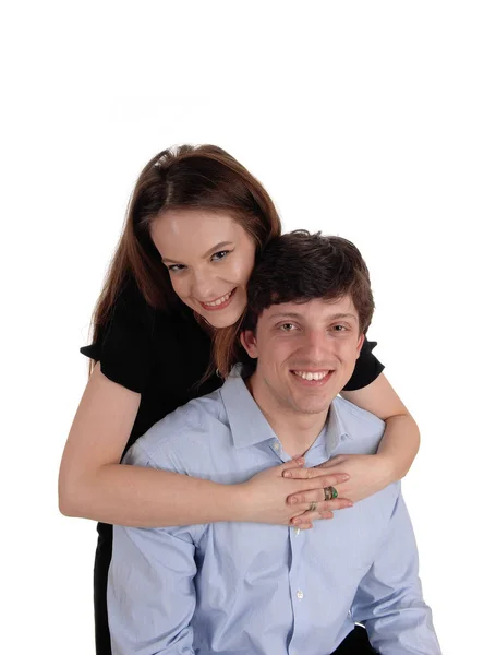 Menina abraçando seu namorado bonito — Fotografia de Stock