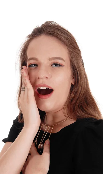 Woman talking behind her hand — Stock Photo, Image