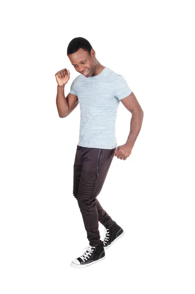 Young African man dancing by himself — Stock Photo, Image