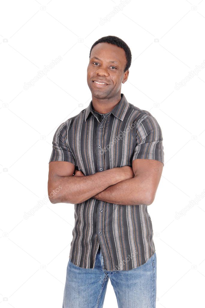Handsome African man smiling arms crossed