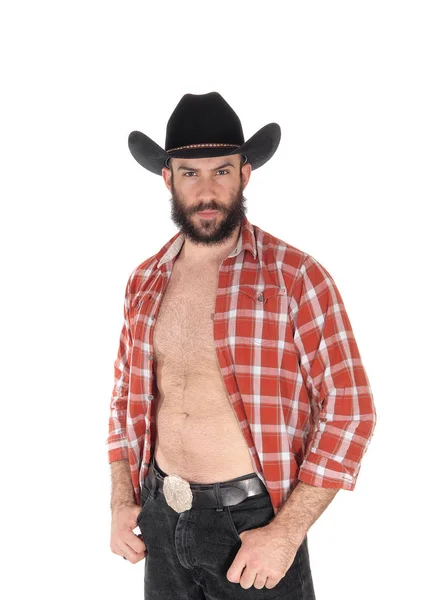 Jonge man met een open shirt en cowboy hoed — Stockfoto