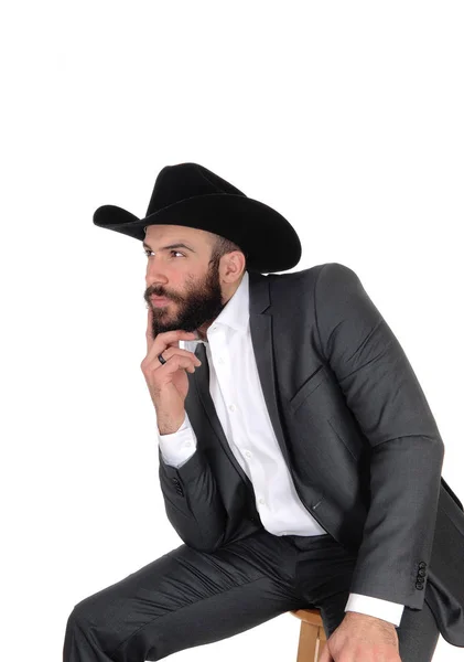 Portret mężczyzny w garniturze i kowbojski kapelusz — Zdjęcie stockowe