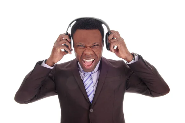 Homem de negócios ouvindo música barulhenta — Fotografia de Stock