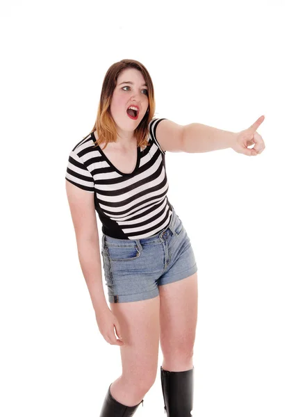 Mujer joven gritando y señalando con el dedo —  Fotos de Stock