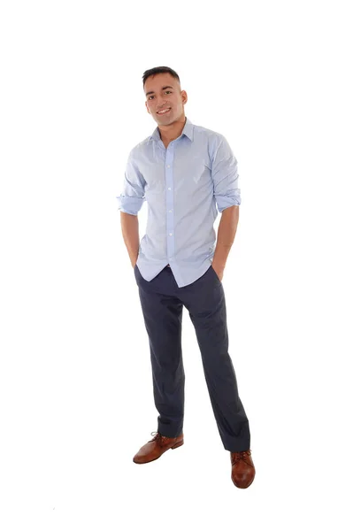 Young man standing with his hands in his pocket — Stock Photo, Image