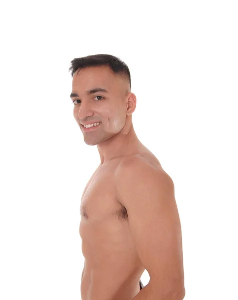 Hombre sin camisa de pie en la cintura de perfil y sonriendo —  Fotos de Stock