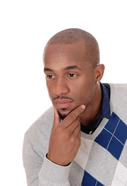 African man with his hand on his chin, thinking — Stock Photo, Image