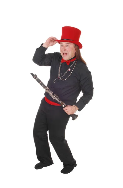 Musician man dancing with his clarinet — Stock Photo, Image