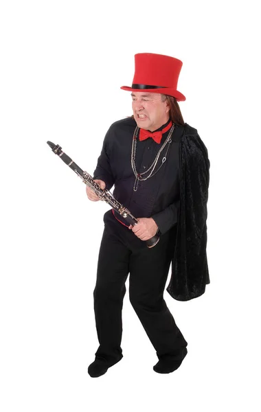 Homem músico dançando com seu clarinete — Fotografia de Stock