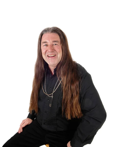En porträttbild av en inhemsk man med långt hår — Stockfoto
