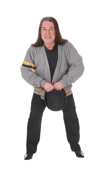 Glad medelålders man dansar med sin svarta hatt — Stockfoto