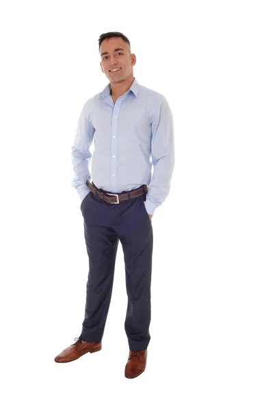 Young man standing with his hands in his pocket — Stock Photo, Image