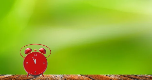 Alarm clock with little minutes to twelve o'clock — Stock Photo, Image