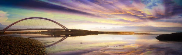 Its a wooden bridge on the lake / ocean / sea — стоковое фото